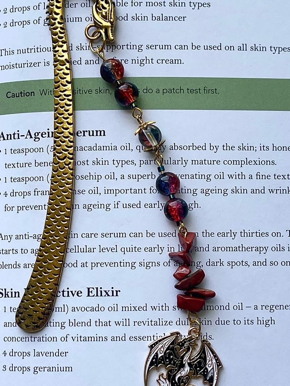 Gold-Tone Bookmark with Red Beads and Bat Charm